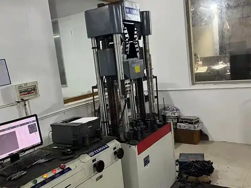 Tensile strength test for DIN6921 flange bolts, fastener quality inspection in factory lab